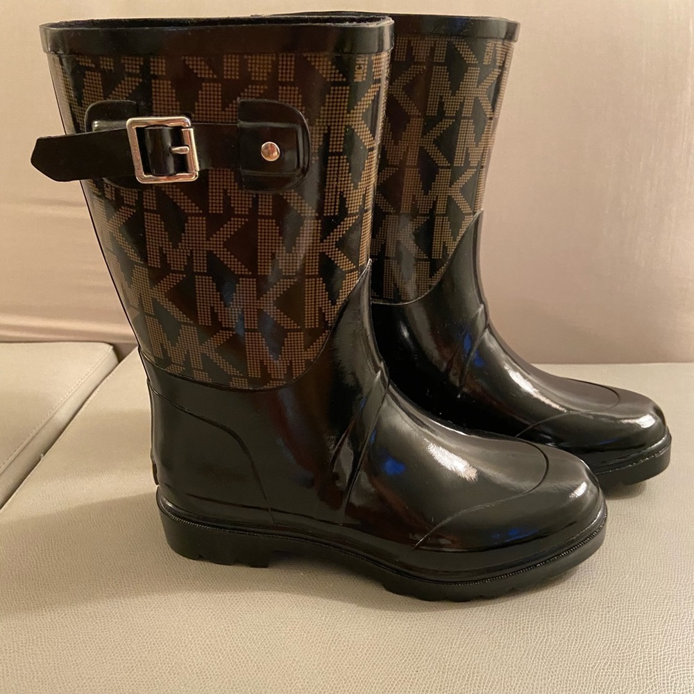 Brand new Michael Kors Rain Boots. Never worn.